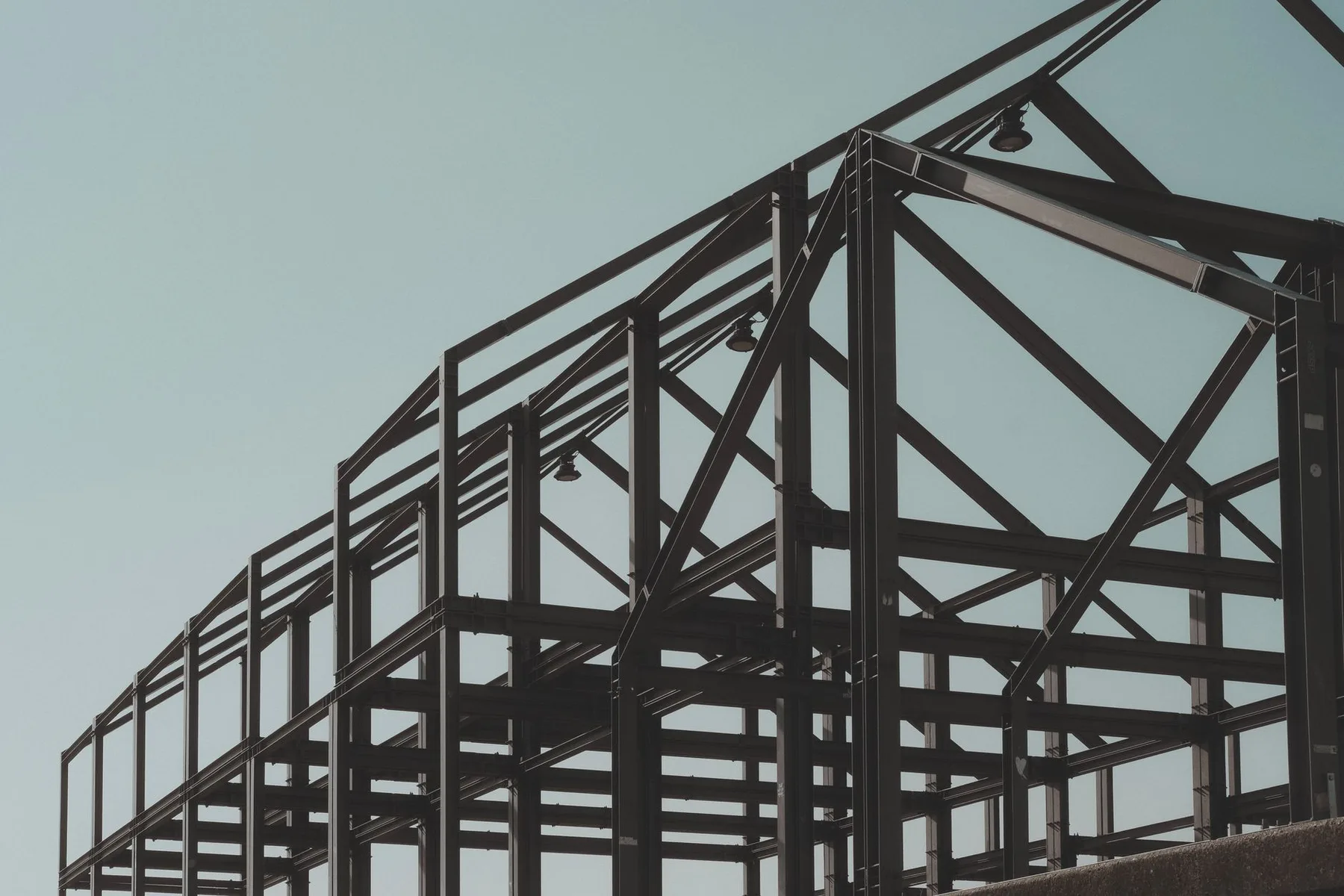 Large construction project with grid overlays and key metrics
