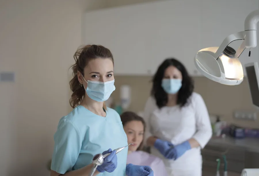 Confident patient portrait in a bright dental clinic