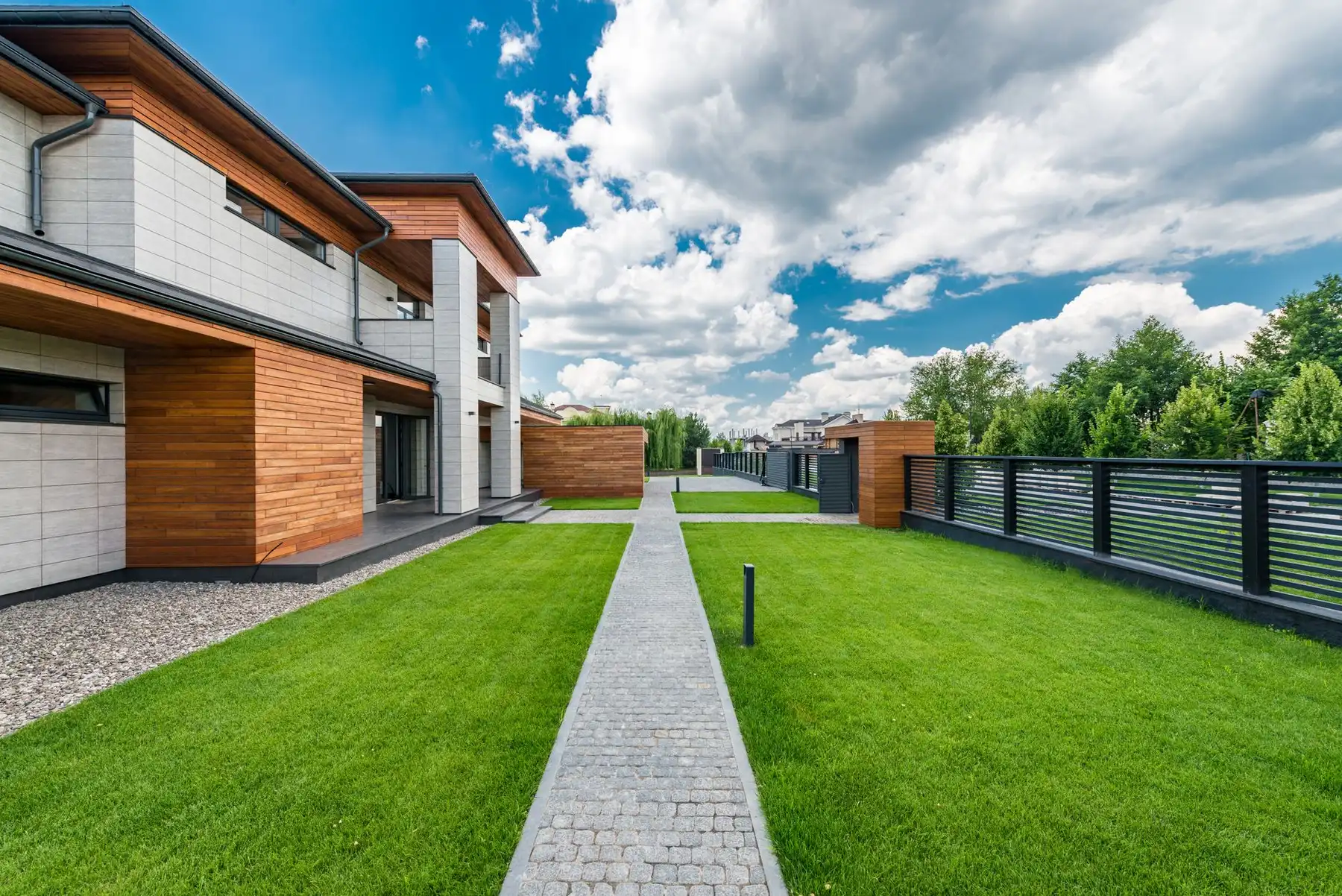 Full-width property exterior with a floating search and filter module