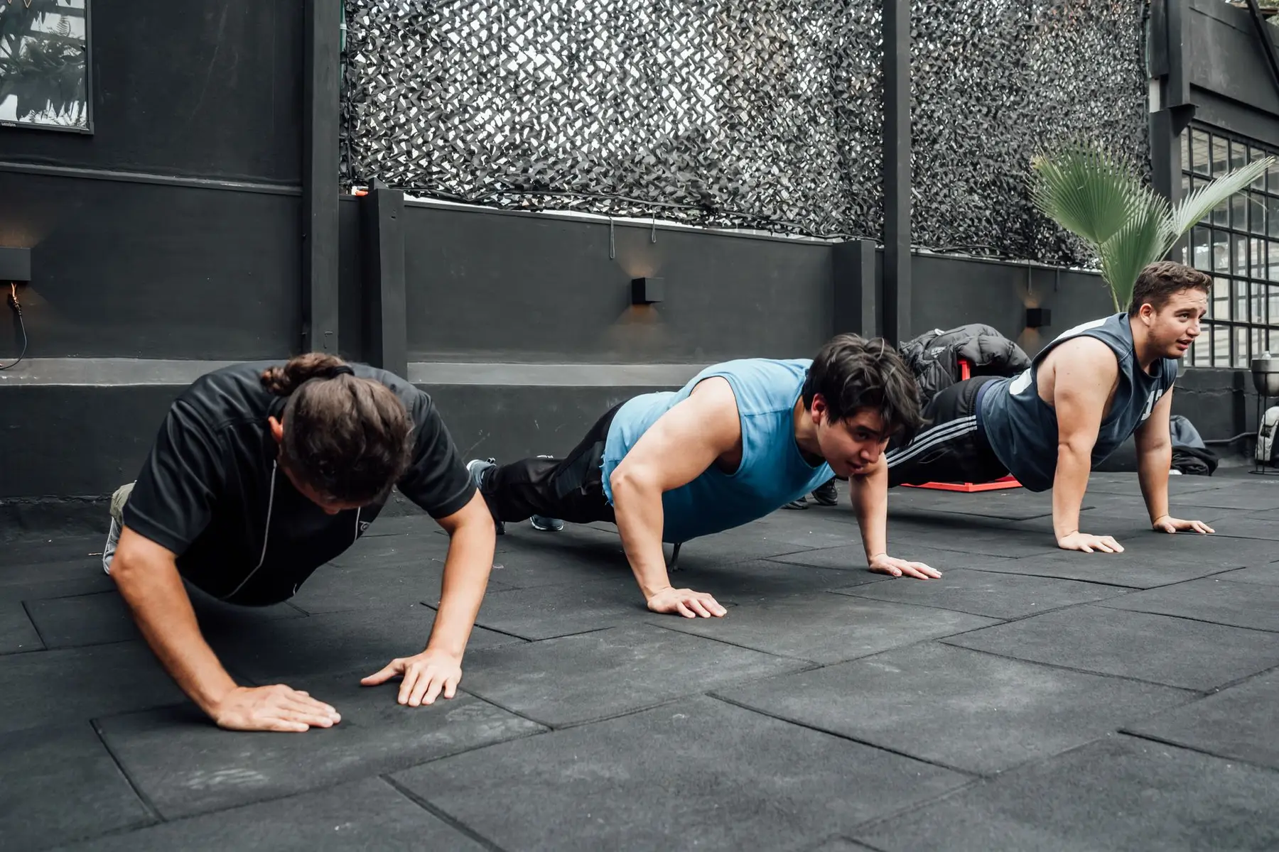 High-energy athlete photography with large kinetic typography
