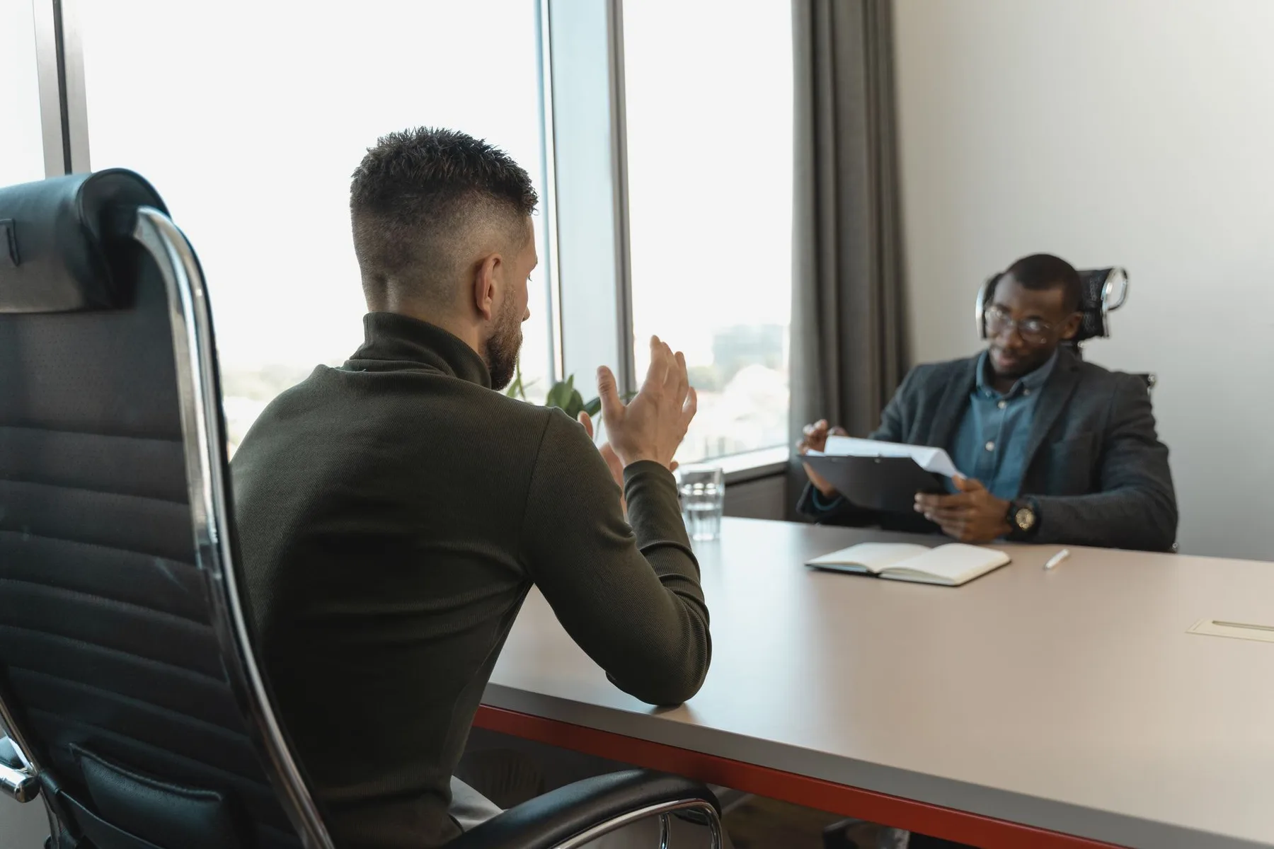 Split employer and candidate narrative with professional portraits